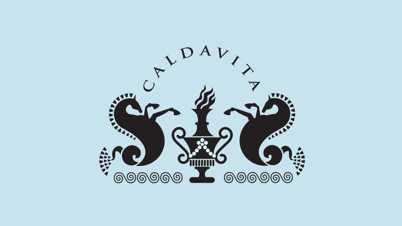 Two water horses with an urn between them and flame for Calda Vita logo