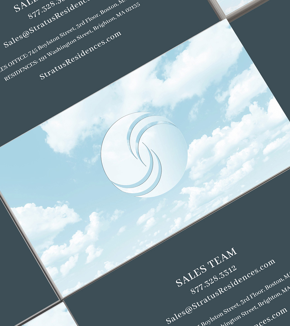 Close up of Stratus Residences business card front and back