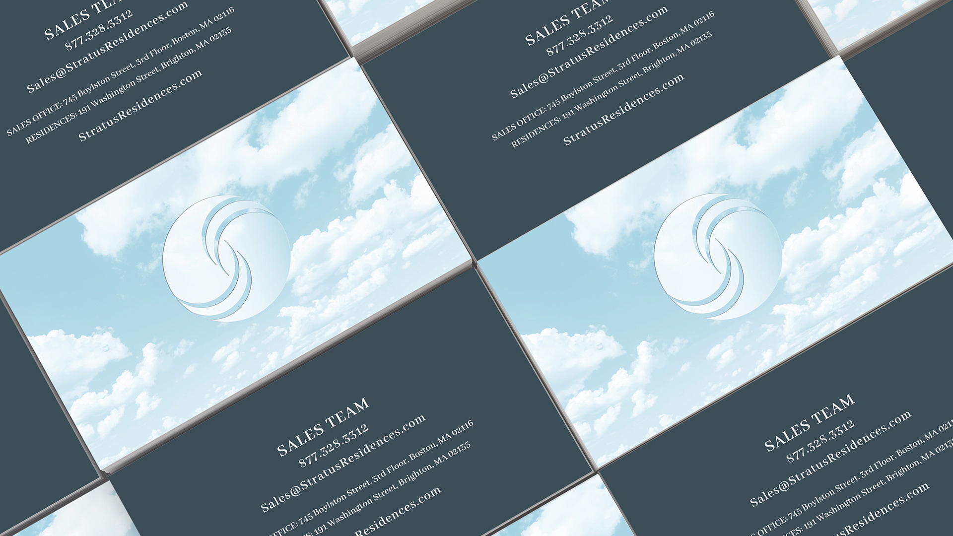stratus residences business cards and logo close up