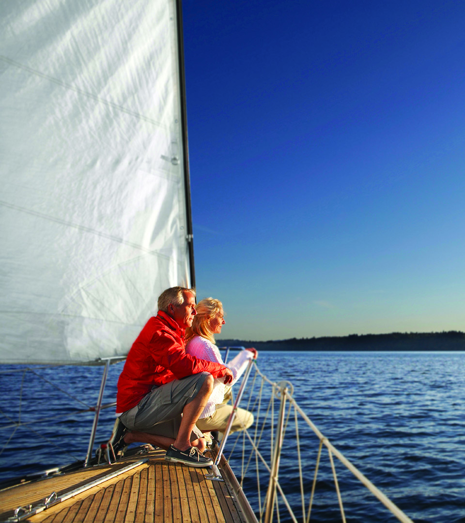 aria couple on sailboat sunset