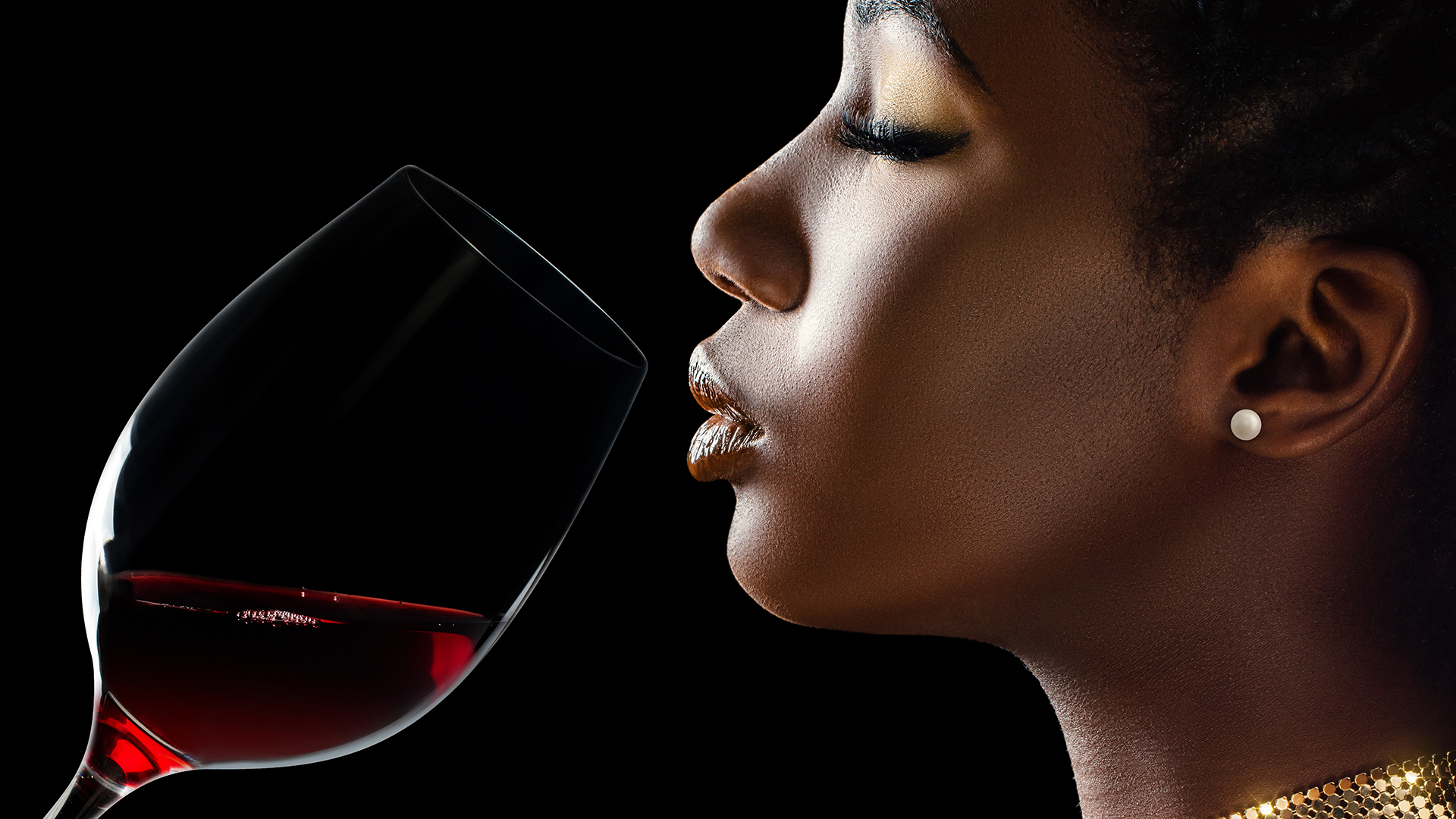 bermans fine wine african american woman drinking glass of red wine