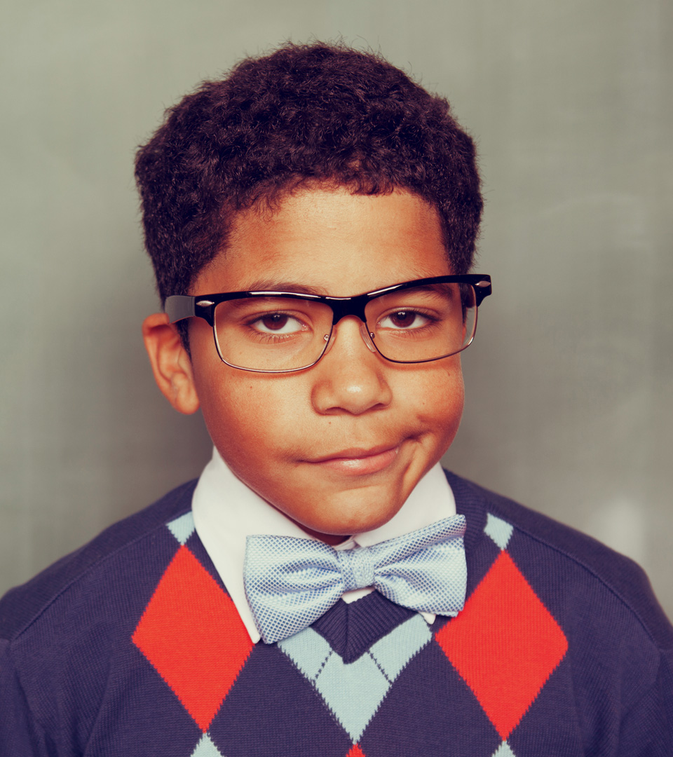 Boston East boy with glasses and bowtie