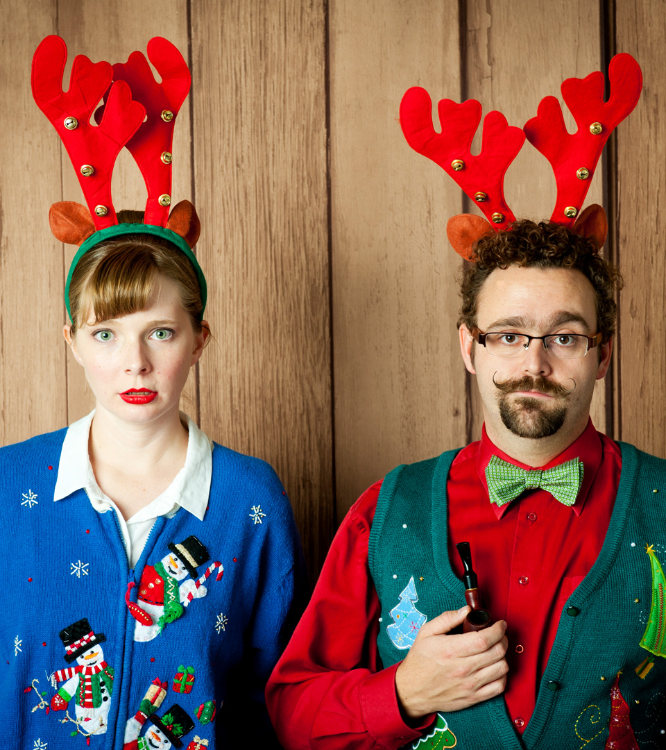 Boston East couple with Christmas sweaters