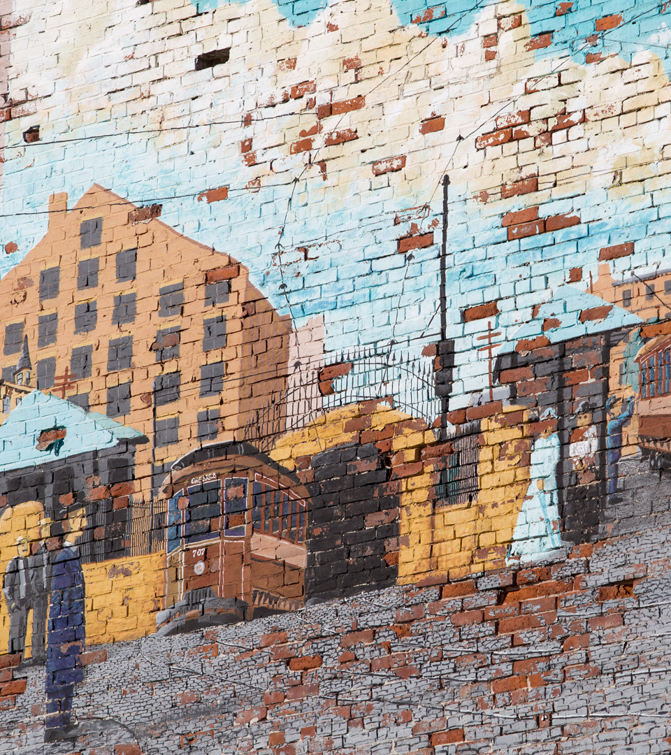 Boston East mural on brick wall