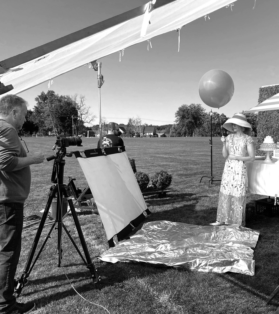 the bristol wellesley bob packert print ad with balloons and cakes