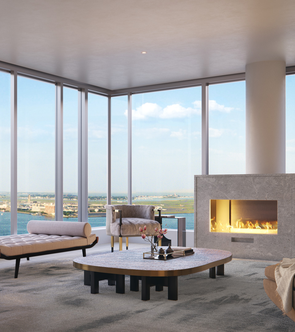 echelon seaport living room with fireplace and view of boston harbor