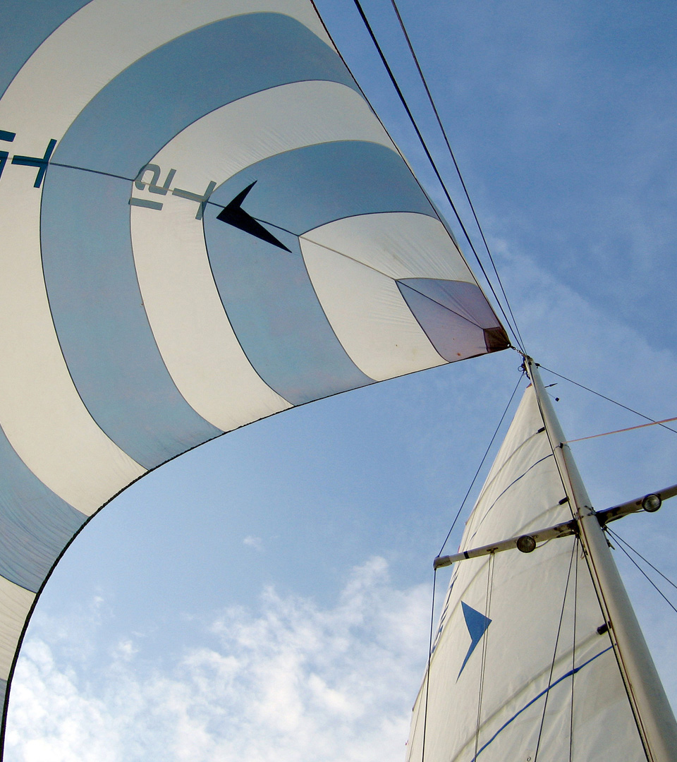 50 Liberty sailboat with striped sail