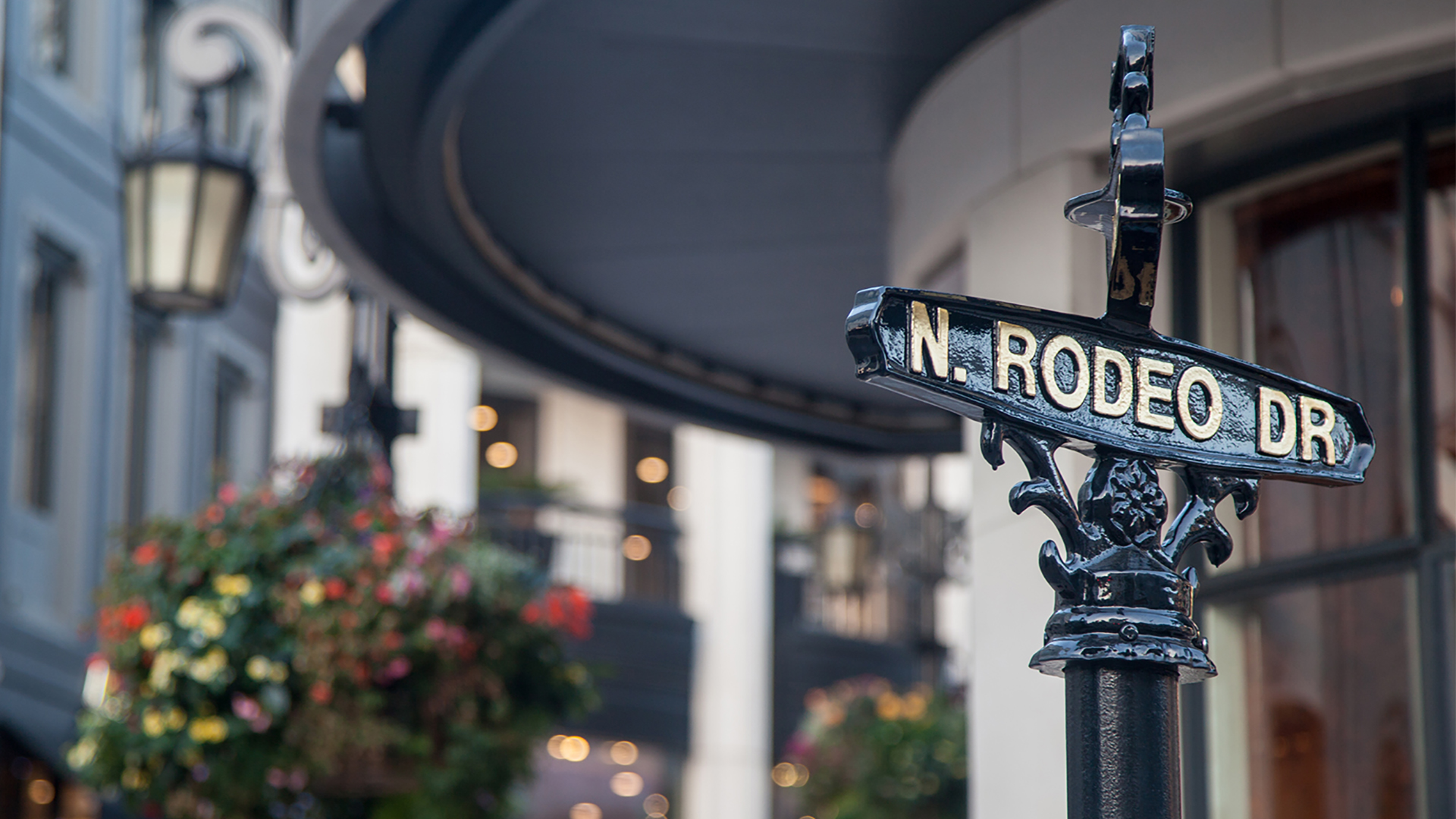 hileman real estate companies rodeo drive street sign close up