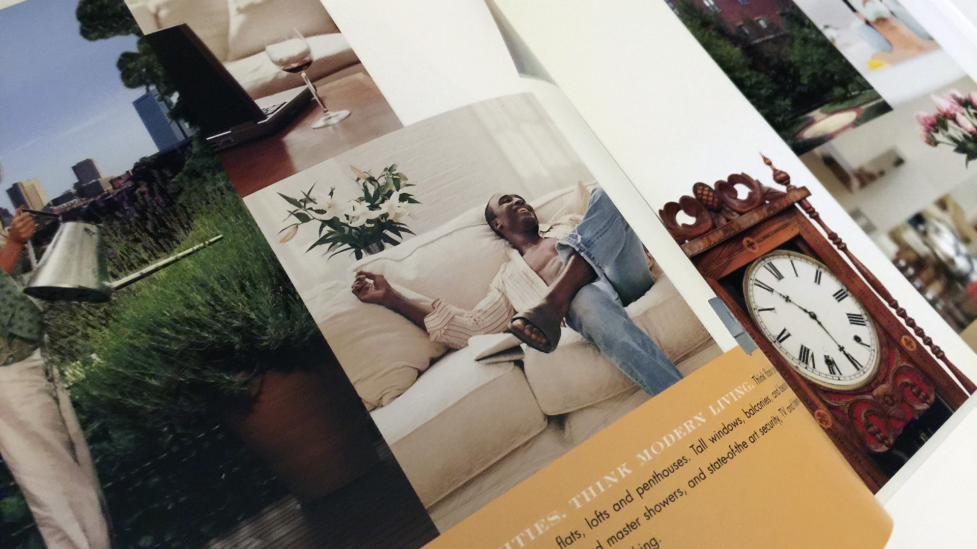 penmark brochure spread with african american on white sofa and clock