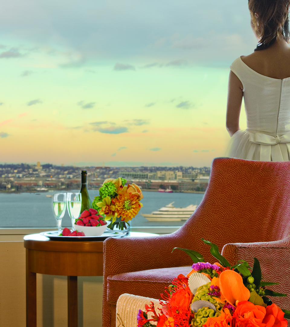 seaport hotel bride looking out window at boat