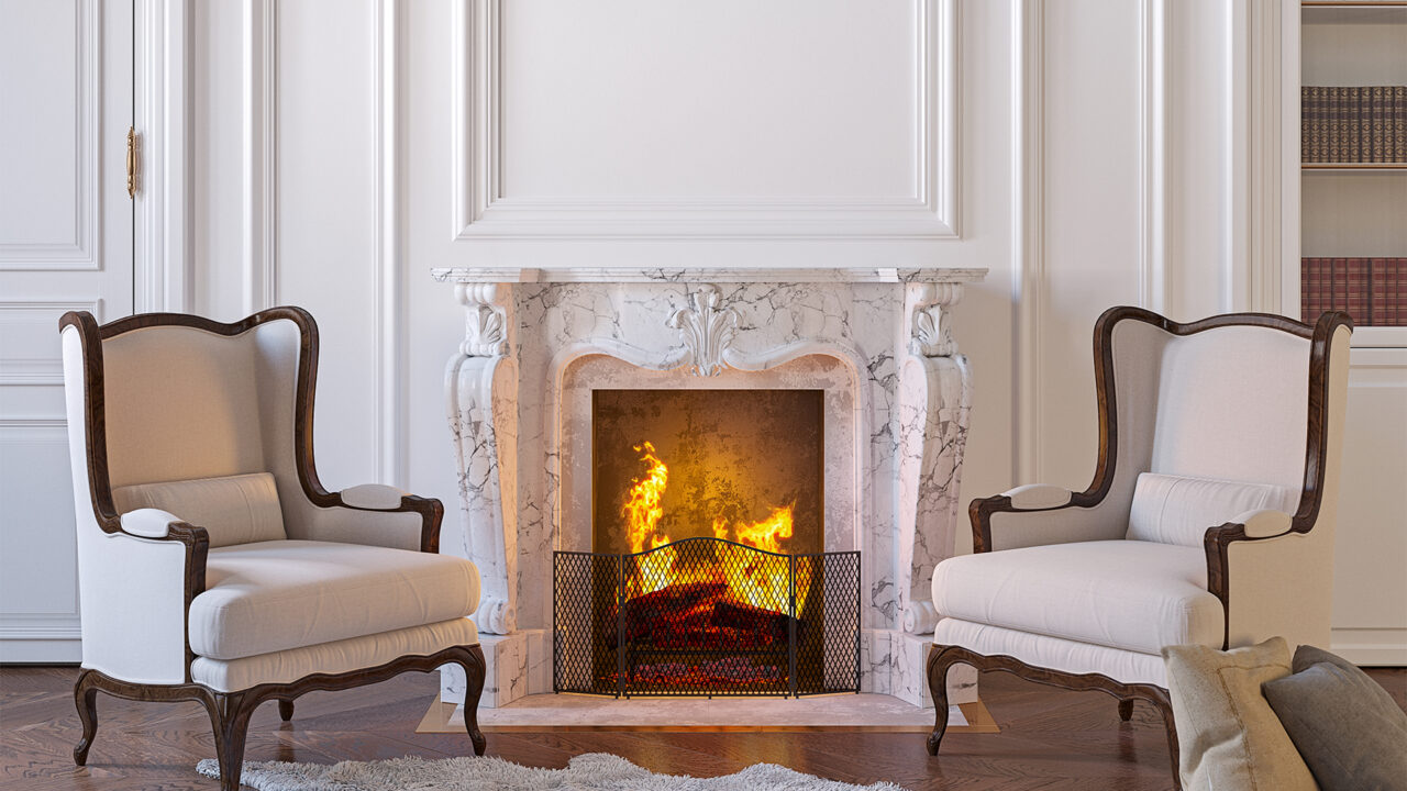 signet residences room with white millwork above fireplace with 2 wingback chairs