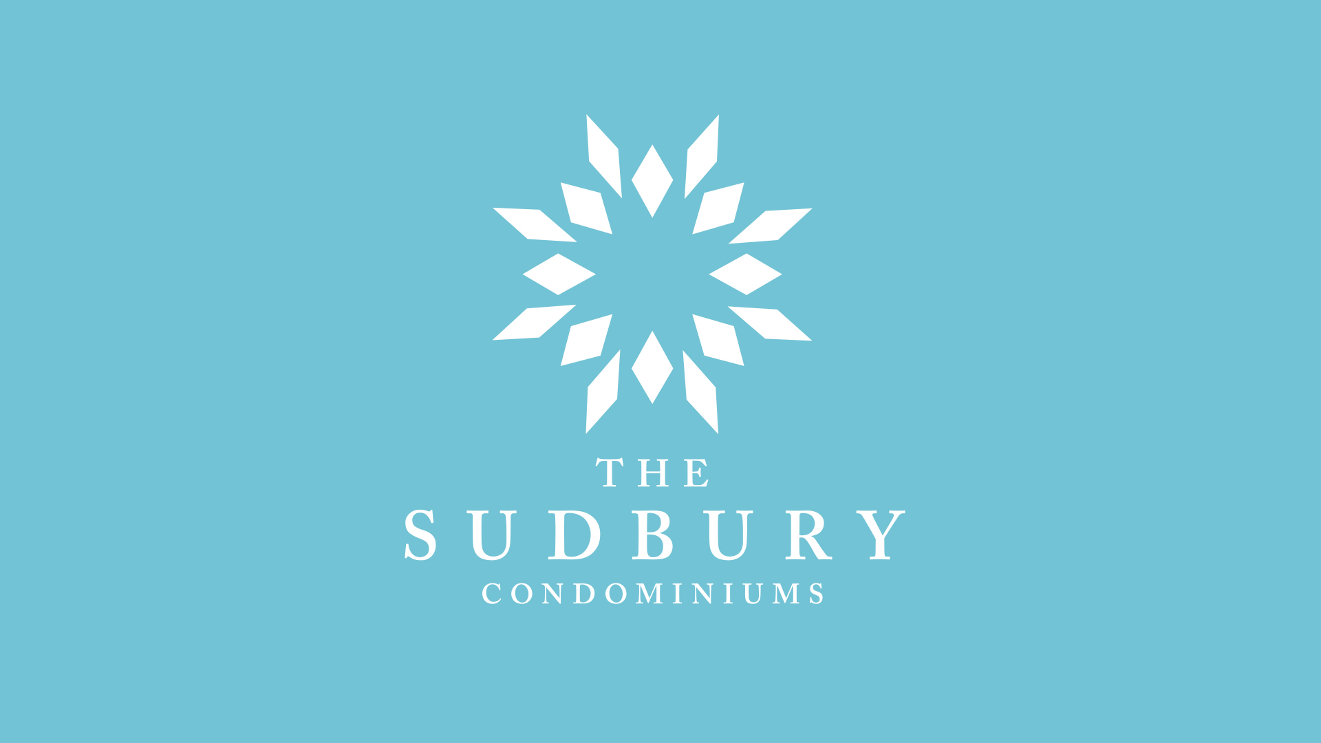sudbury-white logo on blue green background