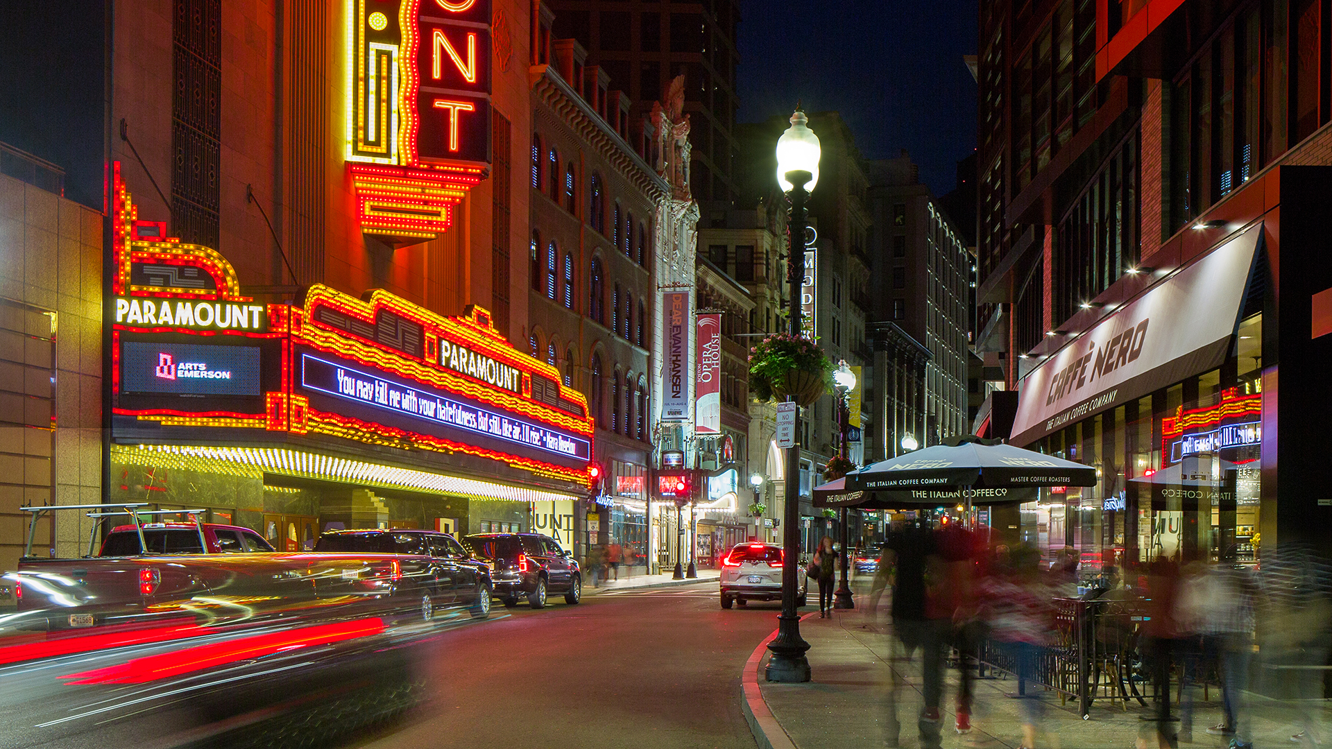 the sudbury downtown crossing with theatre lights at night