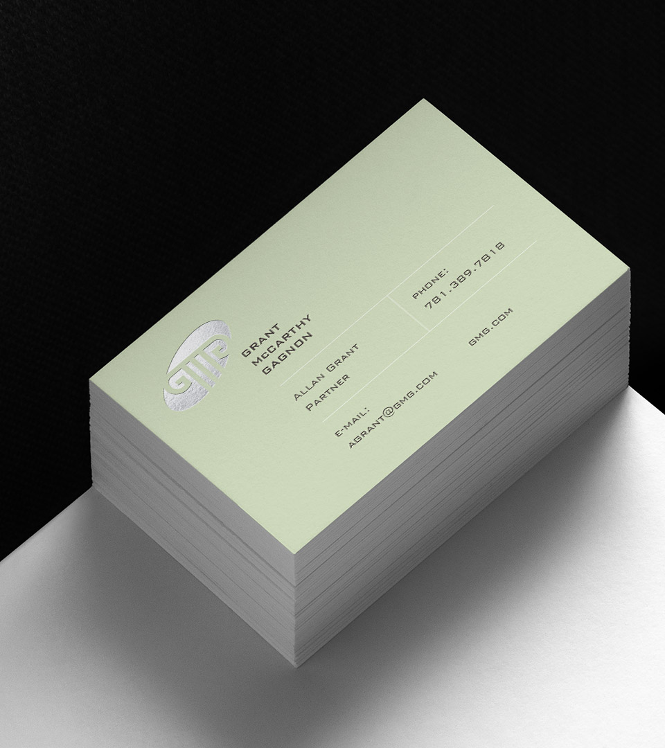 Grant mccarthy gagnon business card on white table