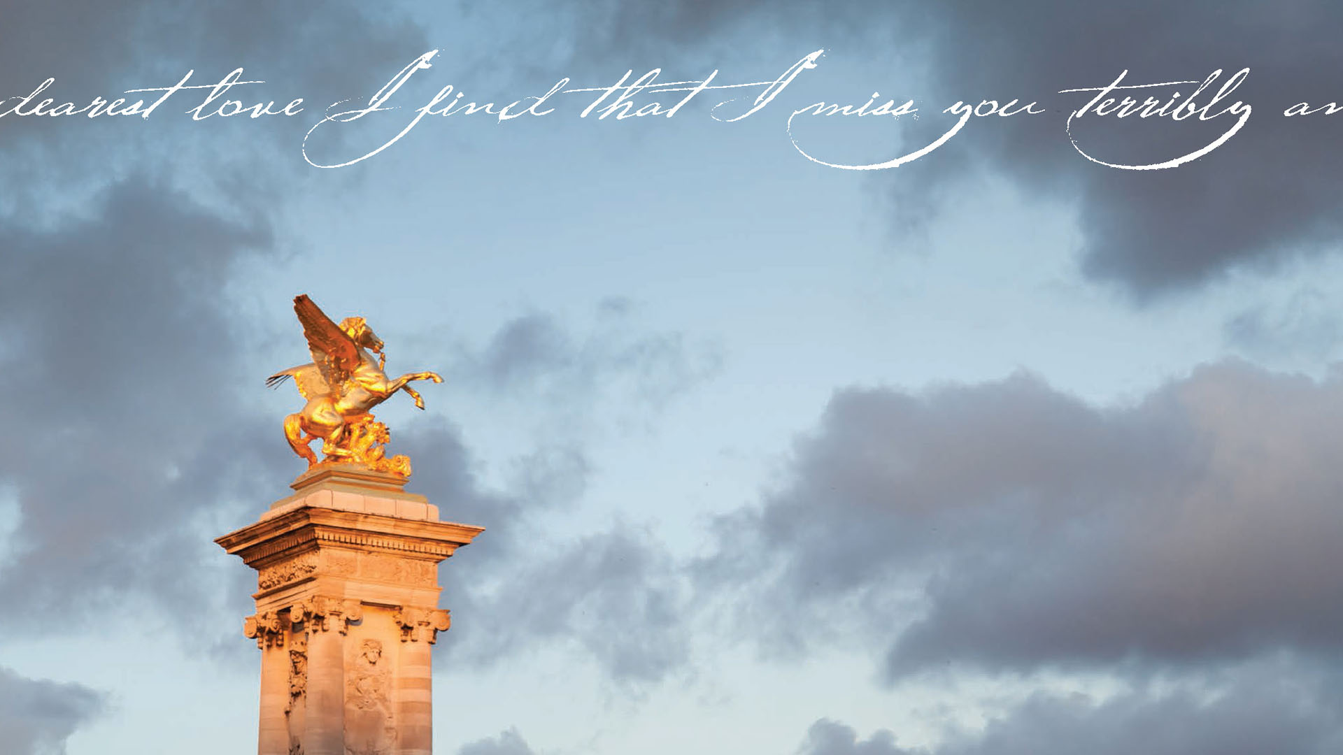 adams packert book gold monument against blue sky