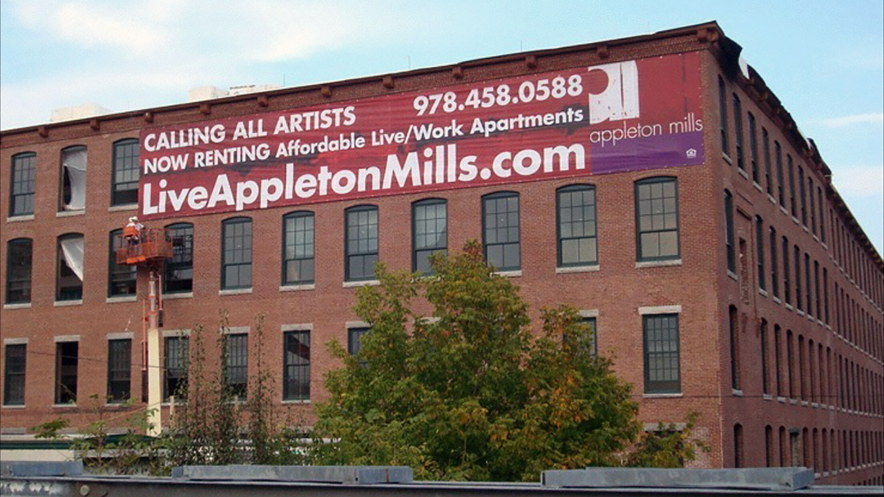 appleton mills building with building banner