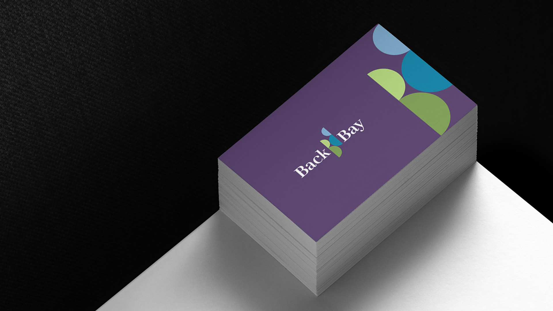 back bay association bid business card on white table