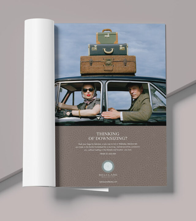 Magazine advertisement for Belclare Wellesley showing a stylish couple in a vintage car with luggage on the roof, promoting boutique luxury condominium living in Wellesley.