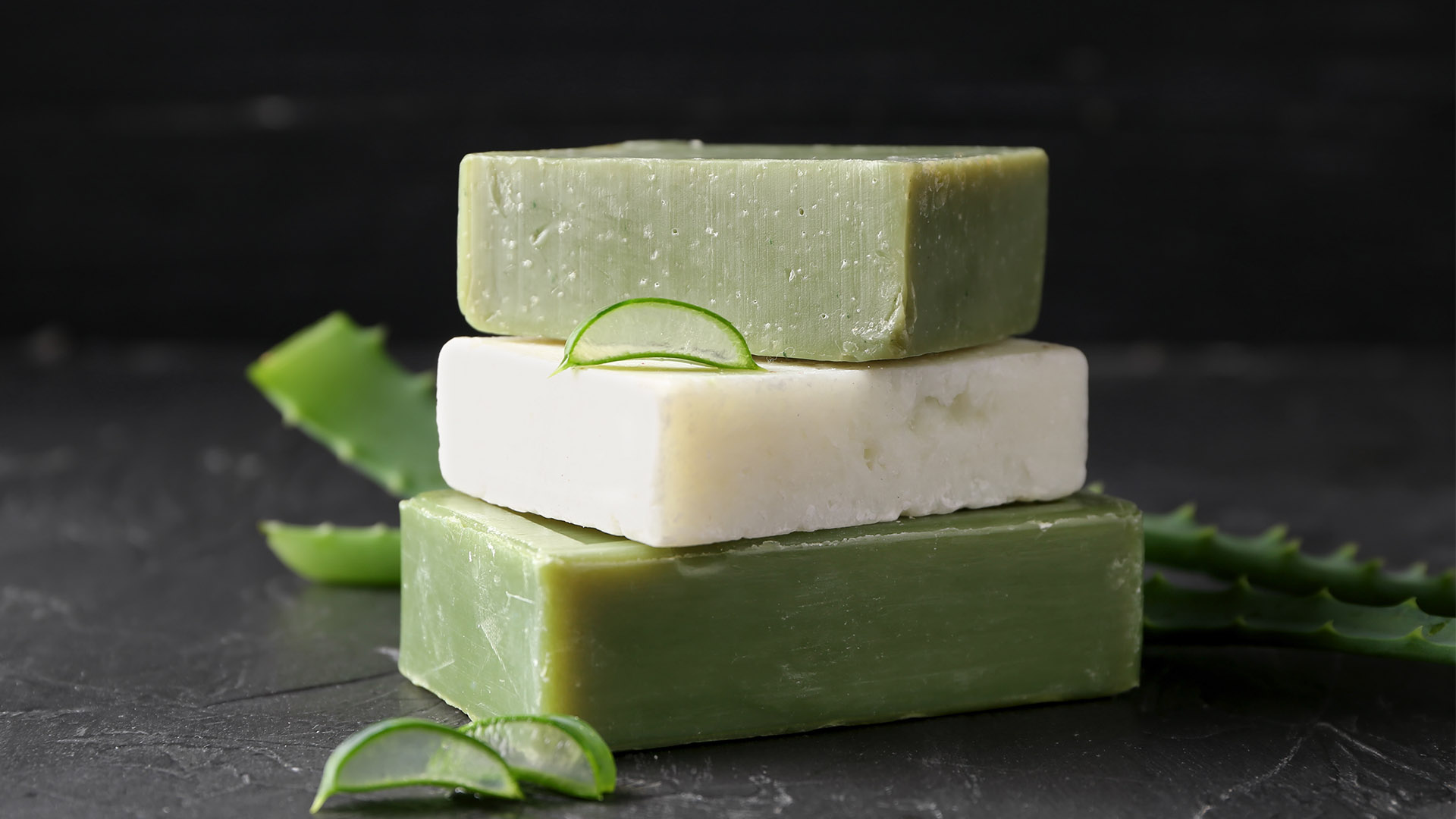 calda vita organic soaps stacked against black background