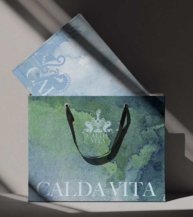 Calda Vita packaging and print layout concepts showcasing the refined visual system.