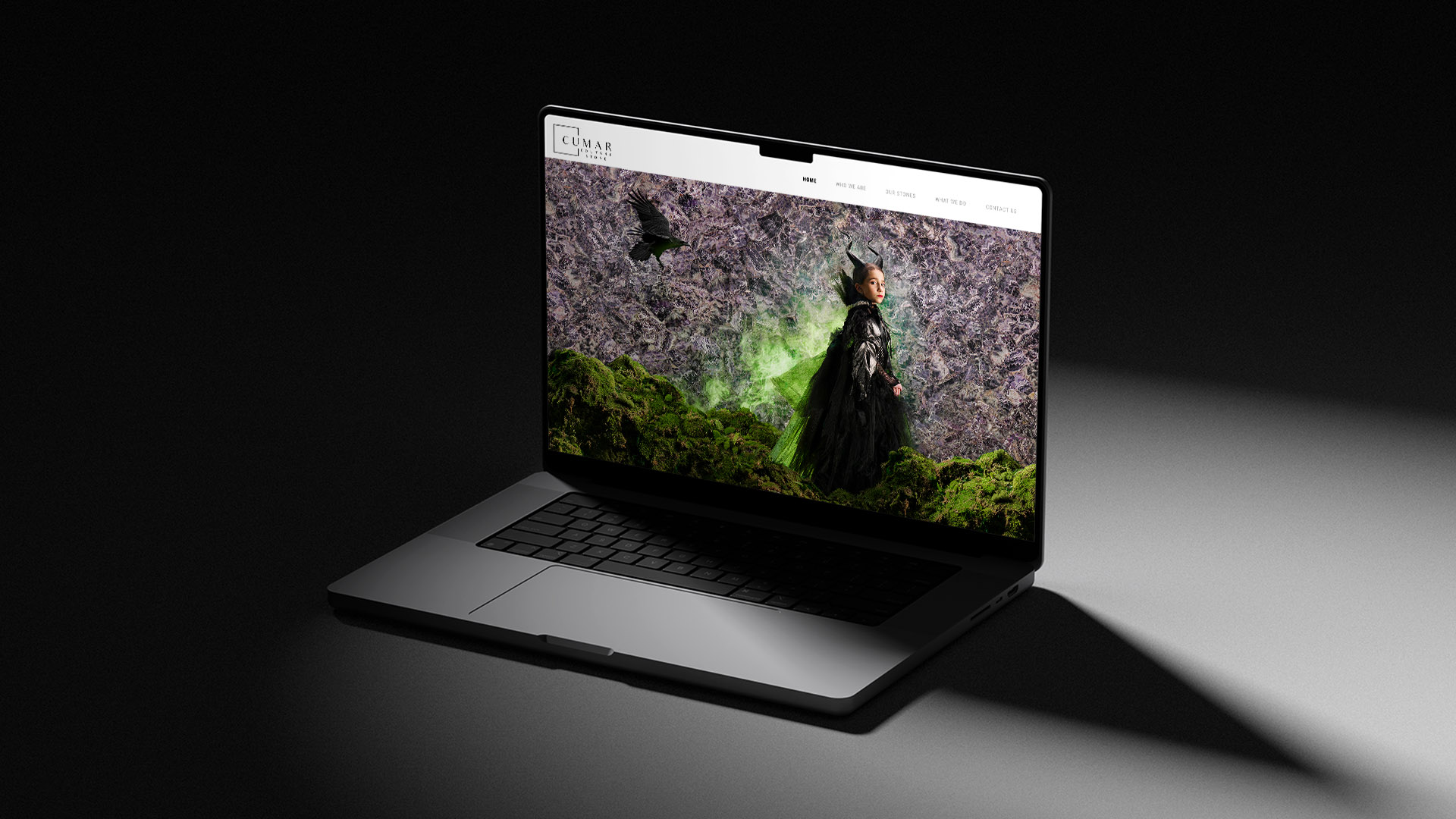 cumar marble and granite website on laptop