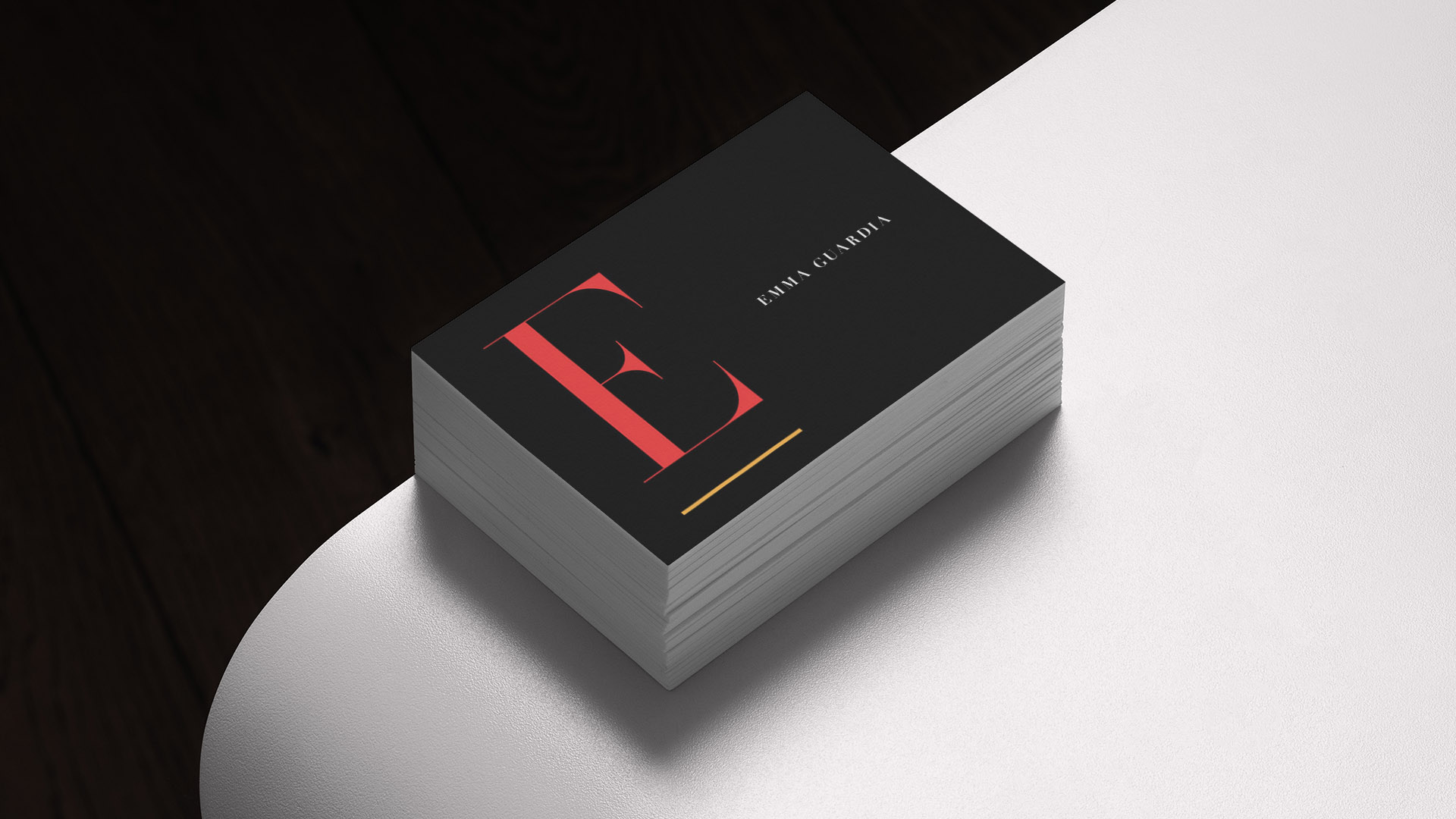 emma guardia business card on white table horizontal