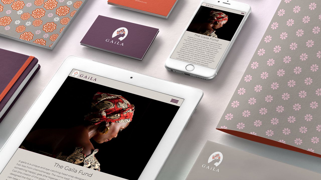 the gaila fund branding page with iPad and business cards