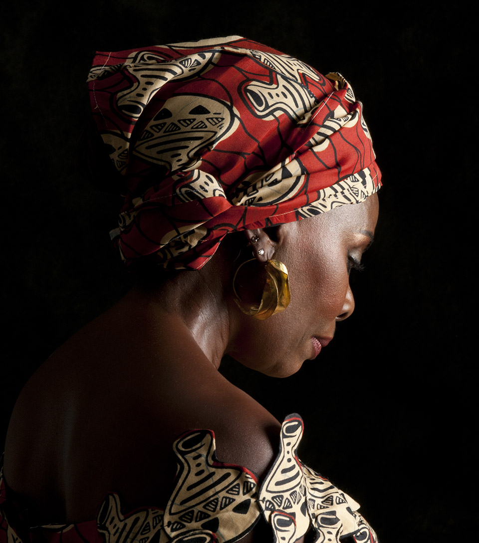 gaila fund african woman with red and black head scarf
