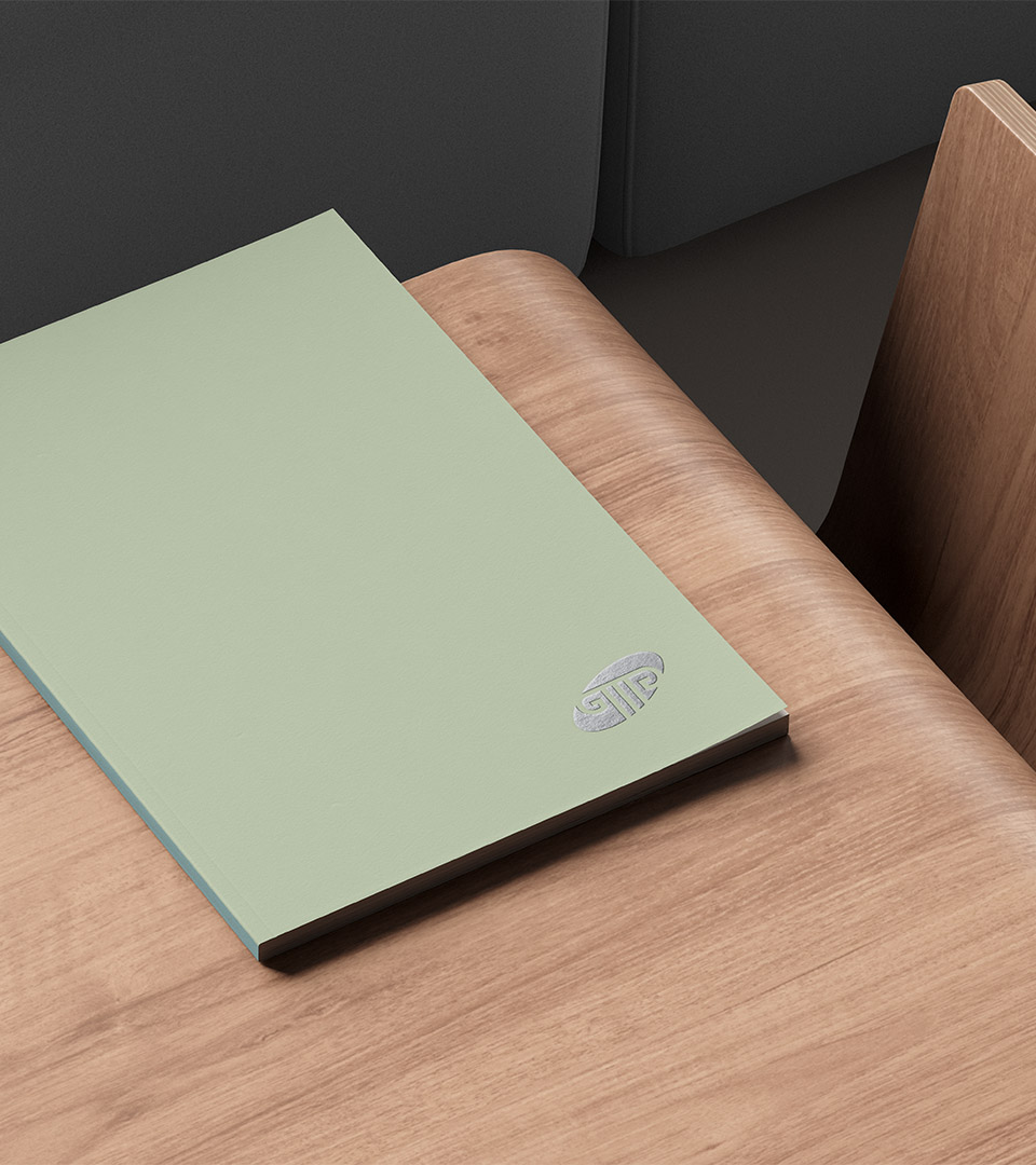 grant mccarthy gagnon folder cover on wood table vertical