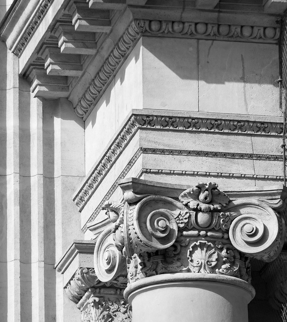 grant mccarthy gagnon ionic column on corner of building black and white