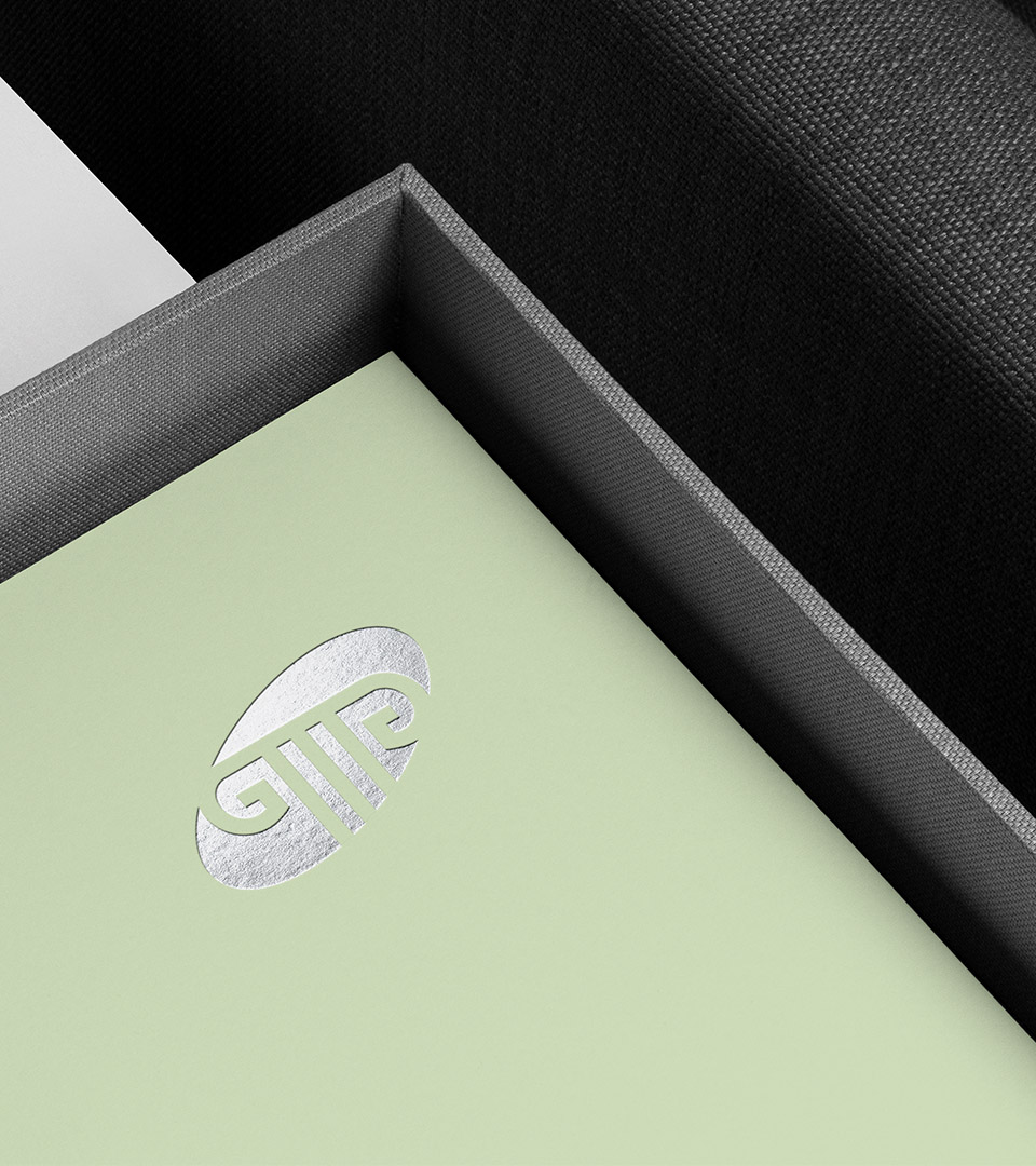 grant mccarthy gagnon silver logo on green in box