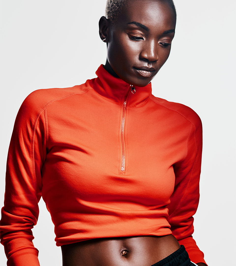 heritage on the garden black woman with orange cropped top