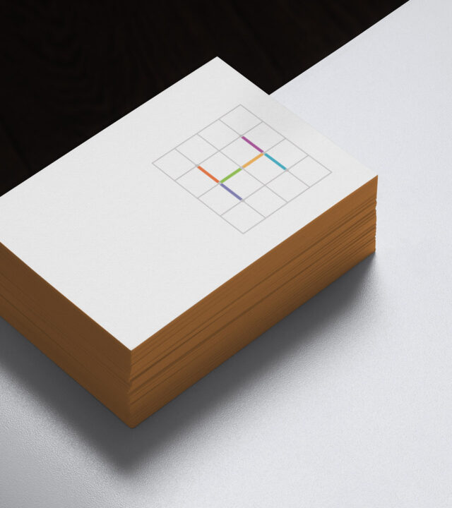 hileman business cards on white table vertical