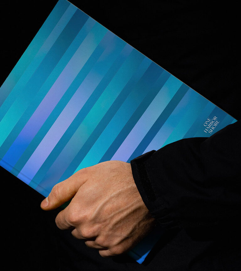 one harbor shore brochure cover with stripes and small logo vertical