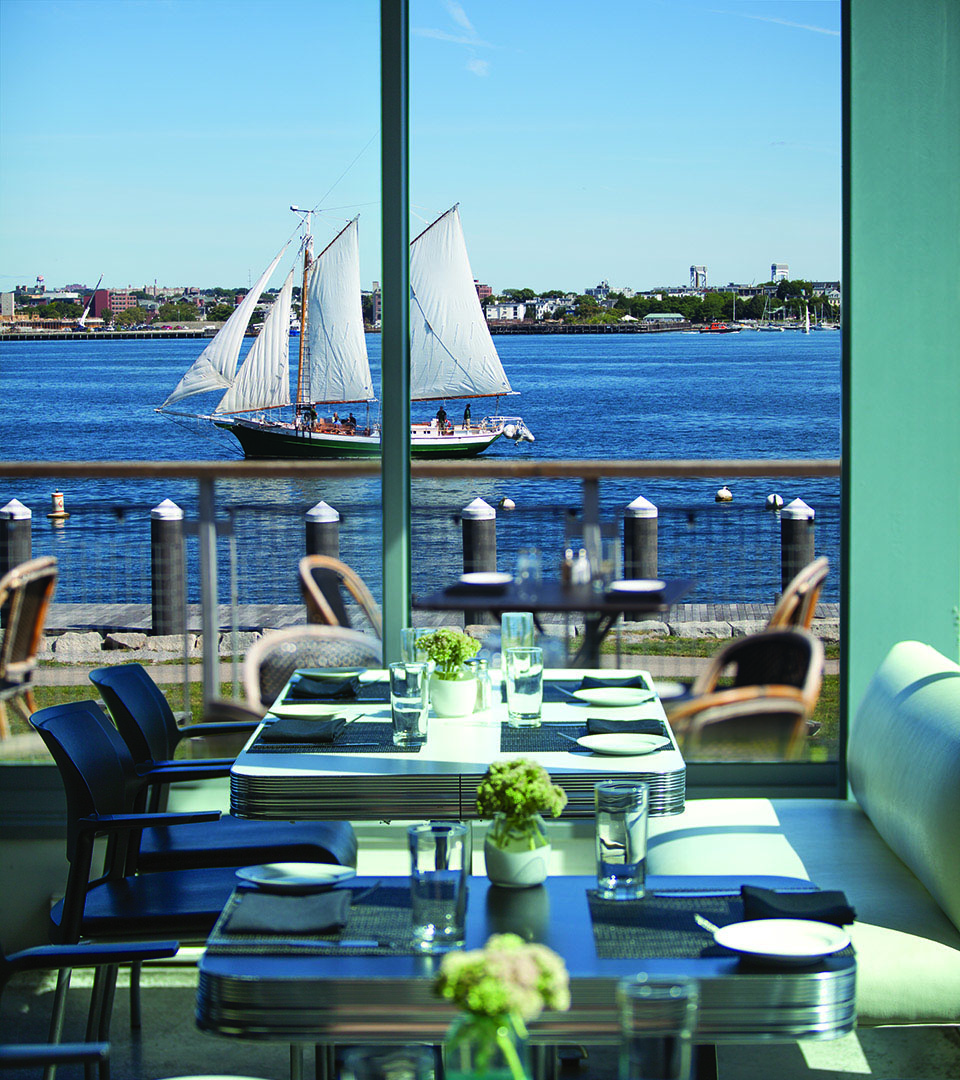 liberty wharf looking out window at sailboat