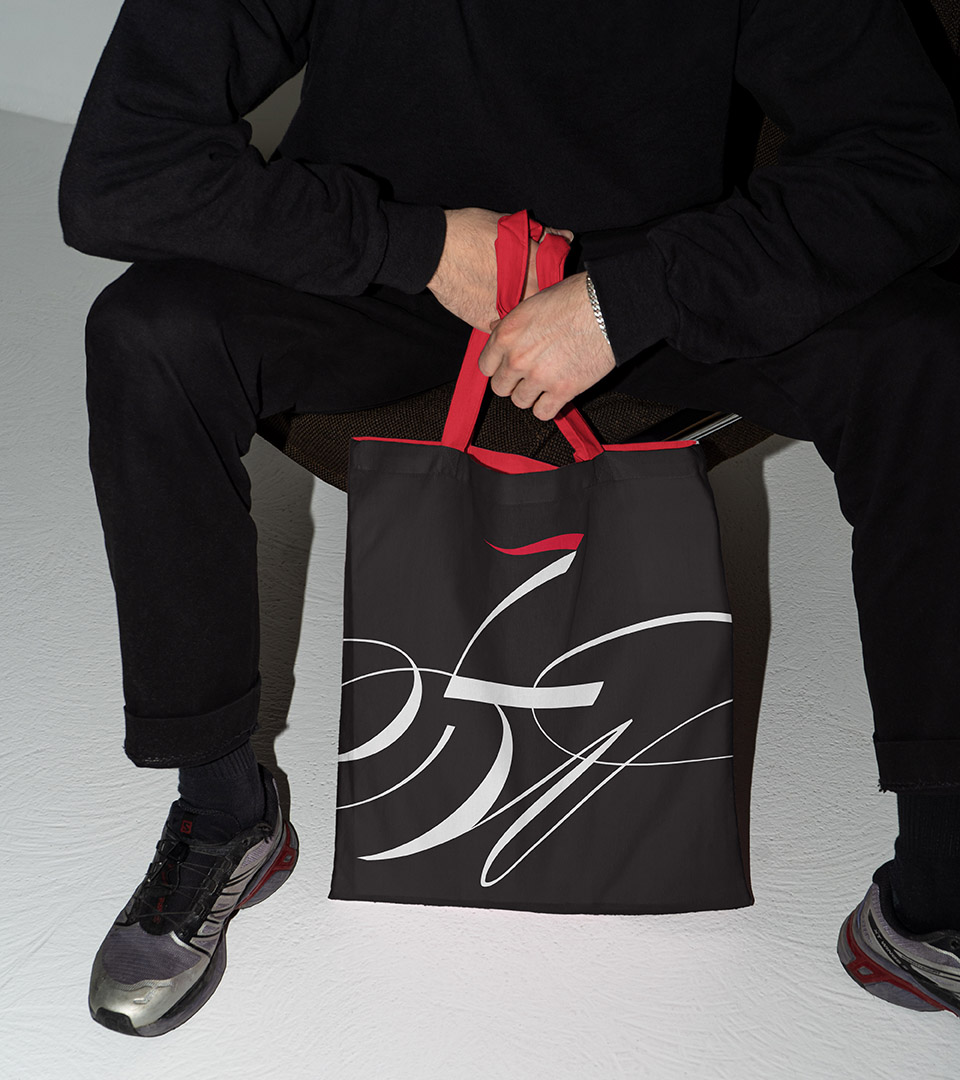 liberty wharf man in black with black shopping bag