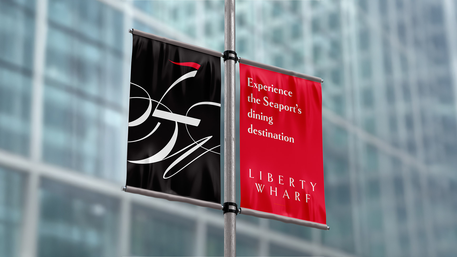 liberty wharf pole flags with black and red panels