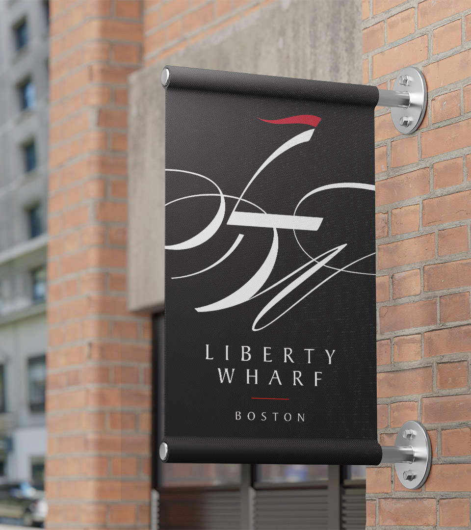 liberty wharf signage on side of building