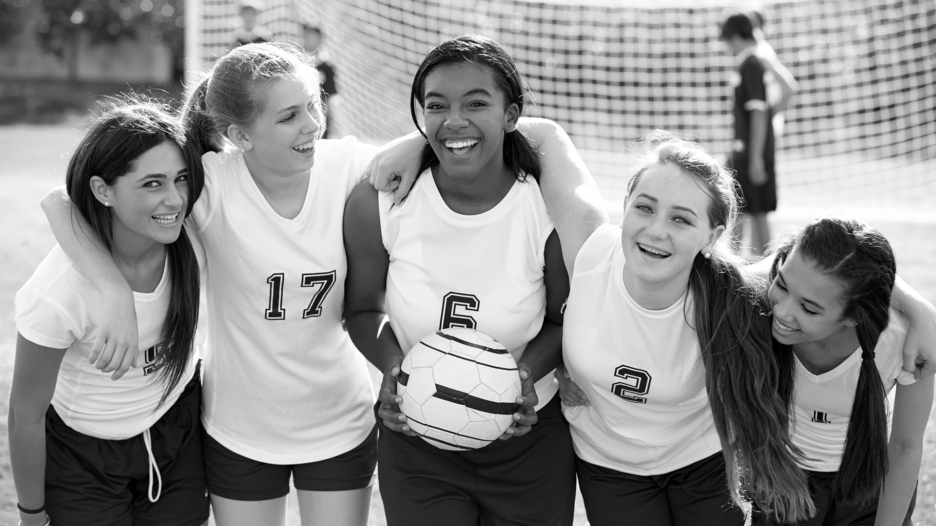 moses brown school girls in huddle playing soccer