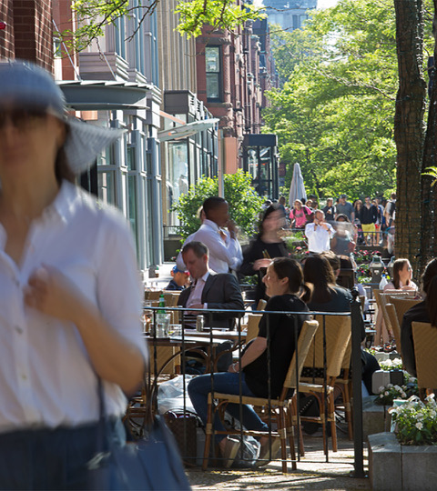 People walking and dining on Newbury Street