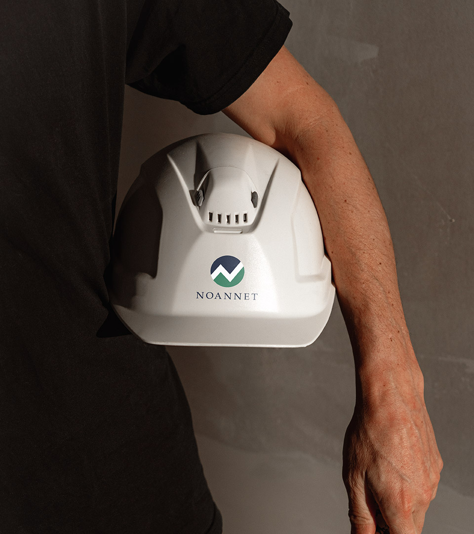 noannet logo on white hardhat