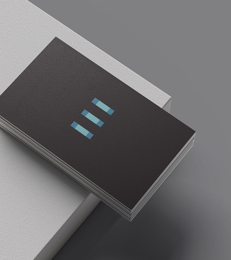 one exeter plaza business card on gray