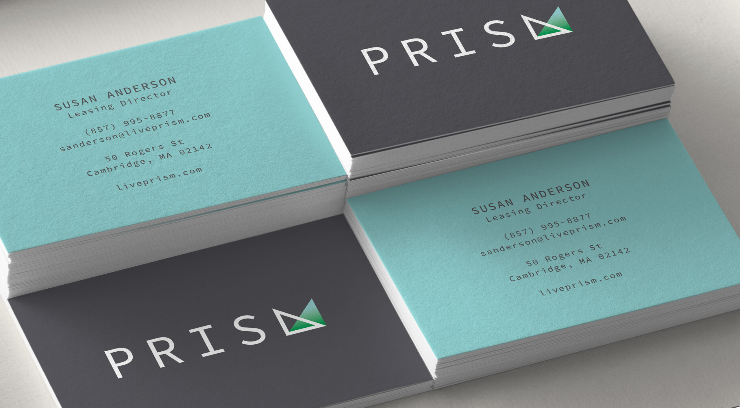 prism-apartments stacked business cards blue green