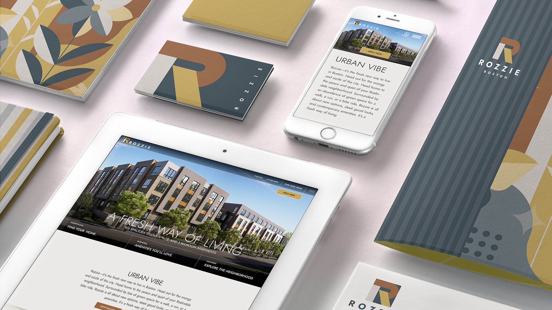rozzie boston branding with ipad and folder