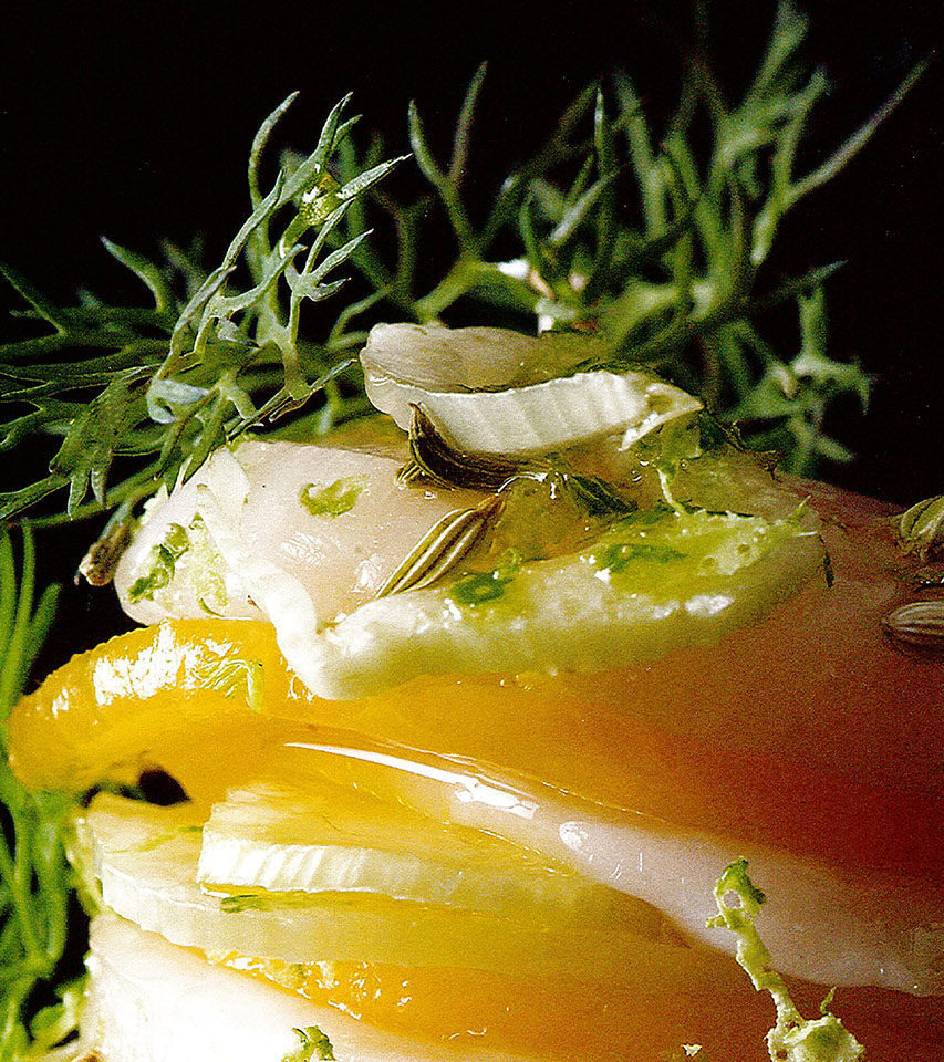 sensing restuarant yellow tomatoes with mozzerella wrapped in rosemary-vertical