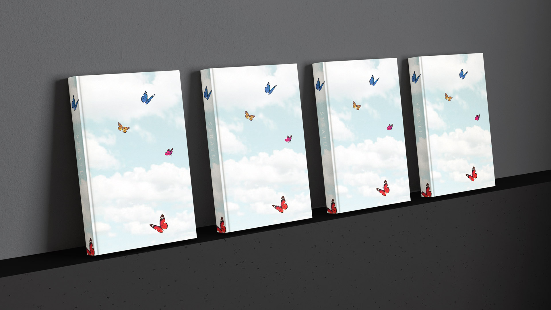 stratus brochures on a shelf with black background
