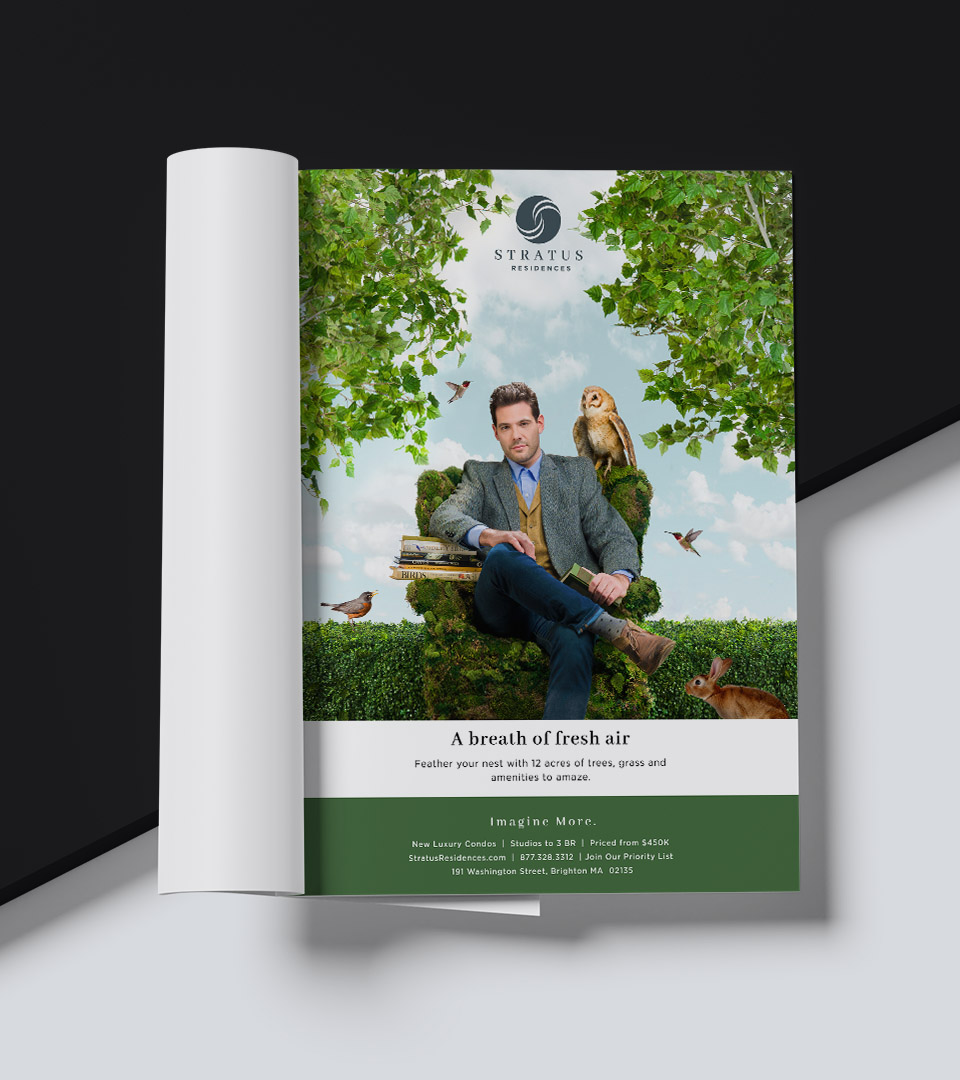 stratus residences man sitting in green chair with owl on shoulder