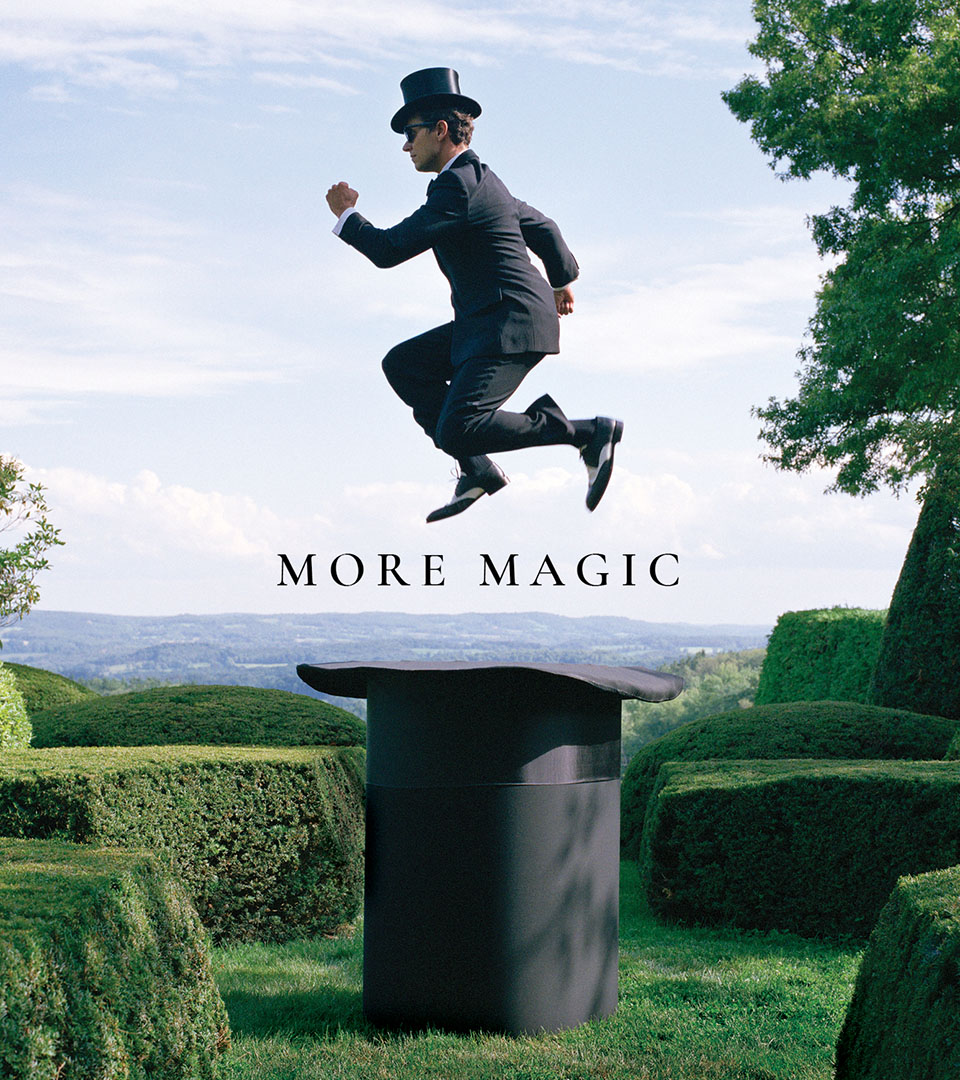 the quinn ad campaign with man jumping over top hat