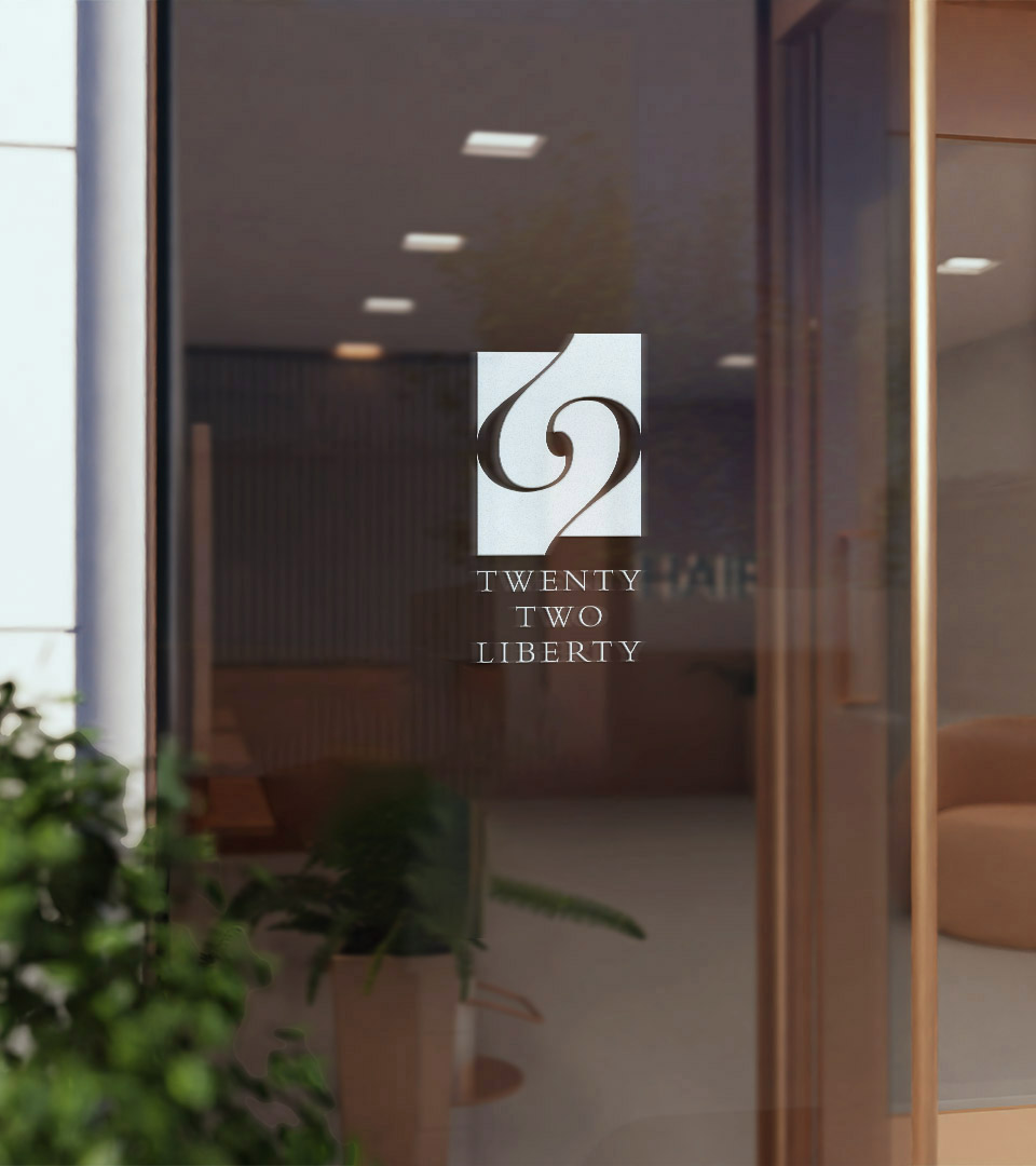twenty two liberty logo on glass window