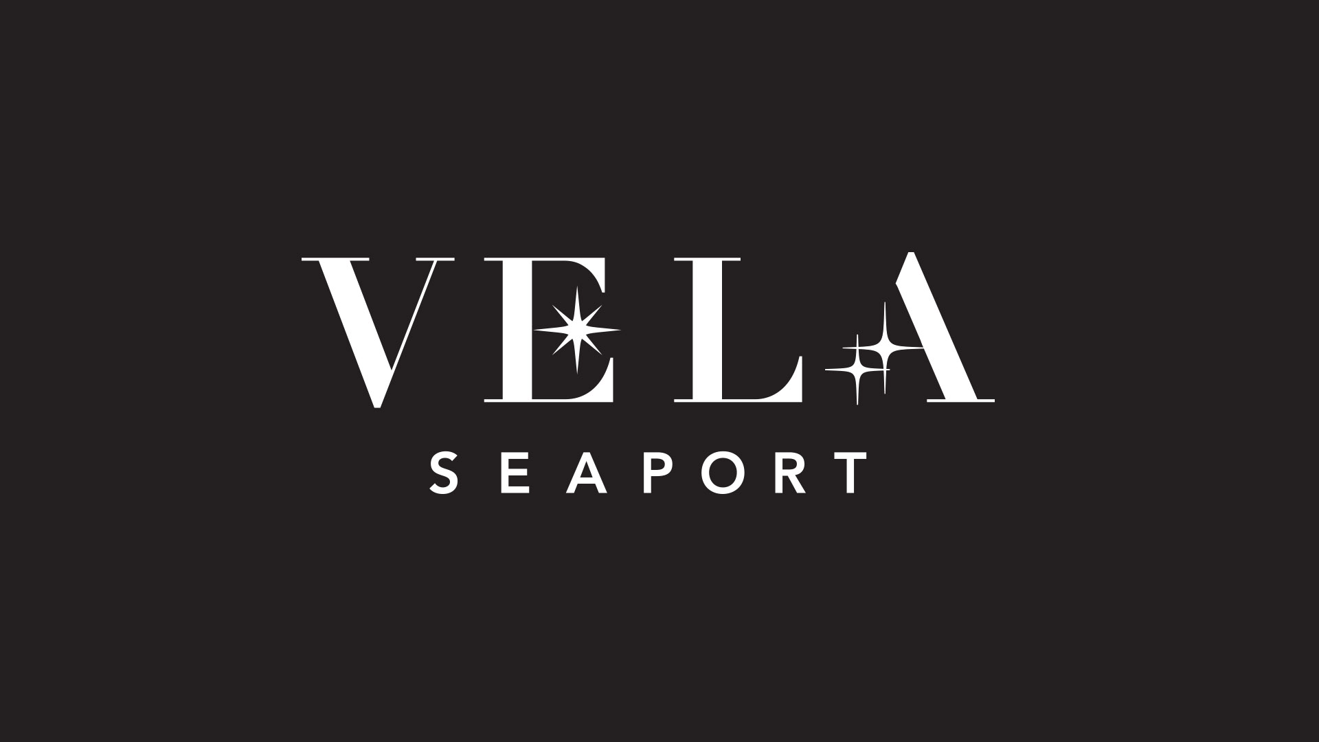 vela seaport logo on black background with white type